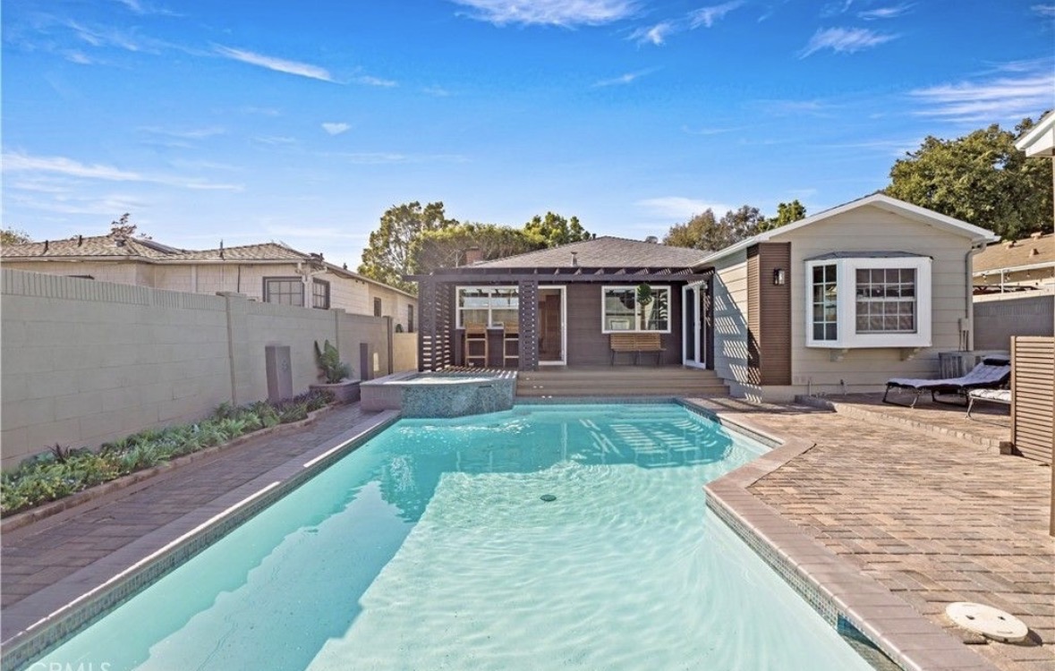 Poolside home with swimming pool