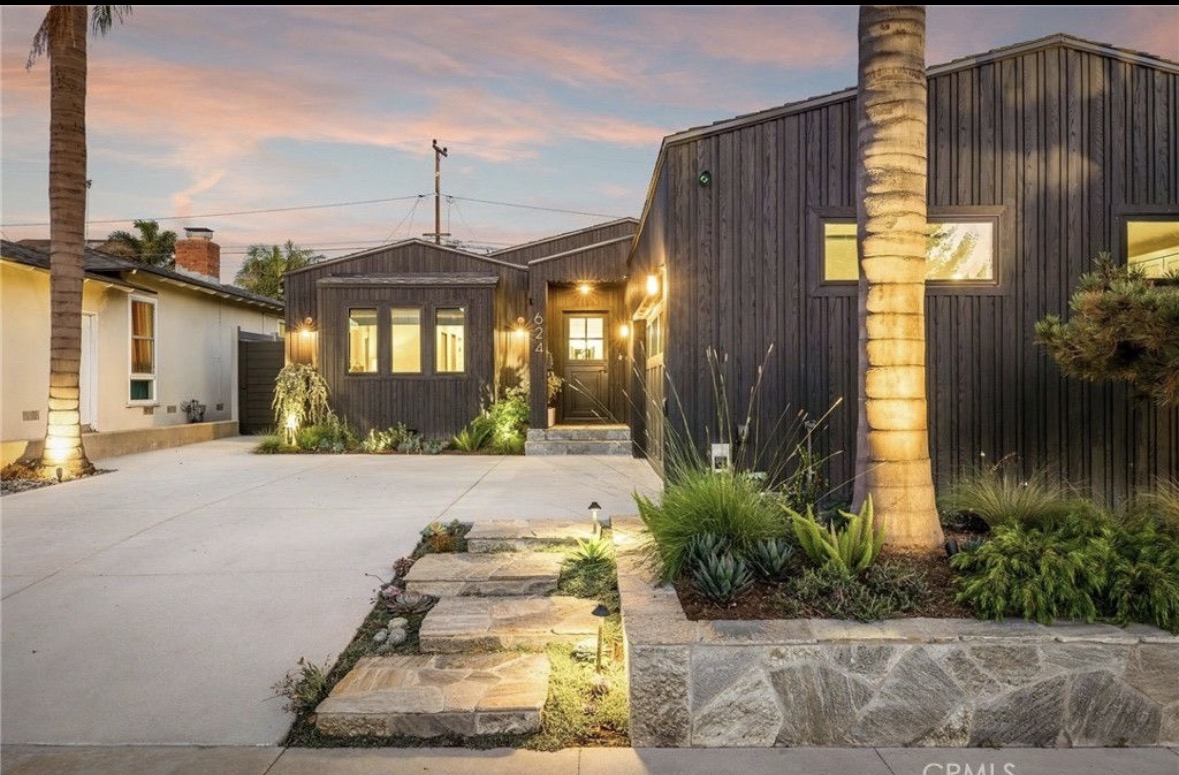Modern dark exterior at sunset